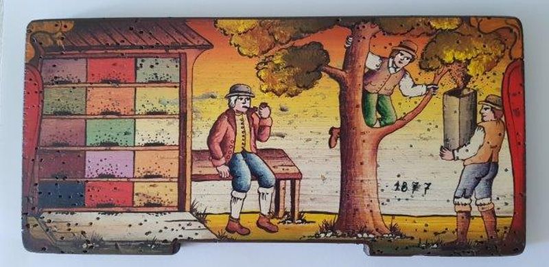Bemalte Bienenstockstirnbretter - Das Bienenhaus und der Bienenzuchter