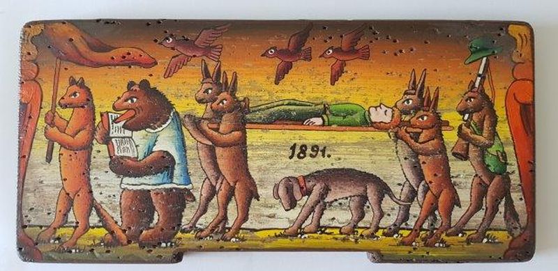 Bemalte Bienenstockstirnbretter - das Begräbnis eines Jegers