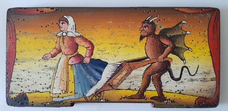 Bemalte Bienenstockstirnbretter - Der Taufel fährt die Frauenunterhosen