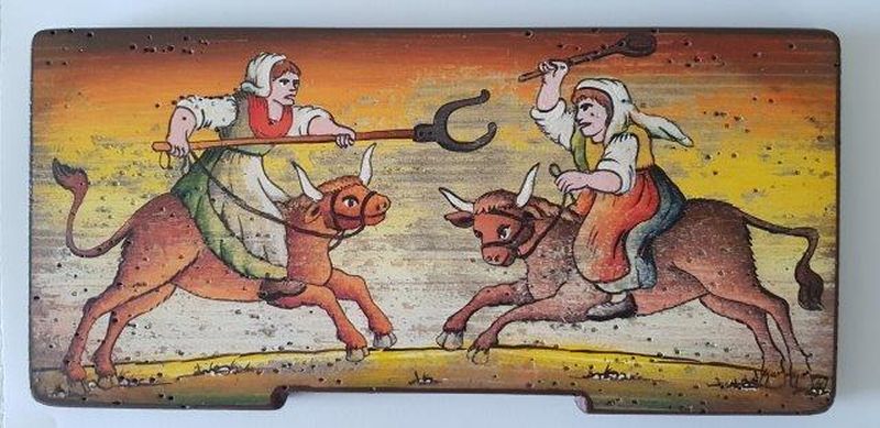 Bemalte Bienenstockstirnbretter - Ein Kampf unter den Frauen