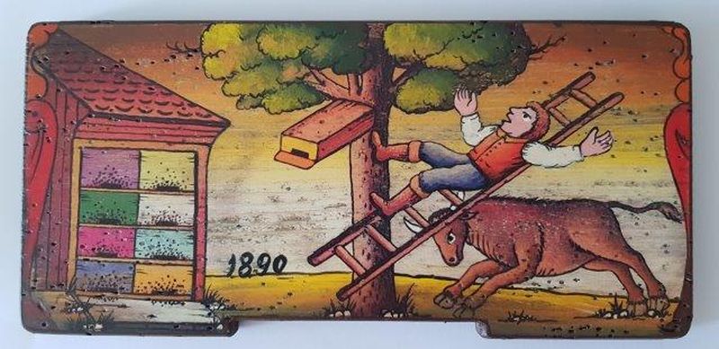Bemalte Bienenstockstirnbretter - Ein Stier überfällt  den Bienenzüchter